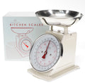 Cream kitchen scales with a large round measurement dial and removable stainless steel weighing bowl.