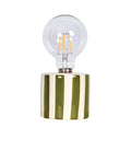 Khaki and cream striped ceramic table lamp with a rounded base and exposed globe bulb.