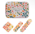 Tin of 30 plasters decorated with colourful pink, orange and yellow ditsy flowers and green leaves.