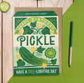 Green Happy Birthday Pickle sentimental seeds greeting card with illustrated pickle, flowers and the words Have a Dill-lightful Day.