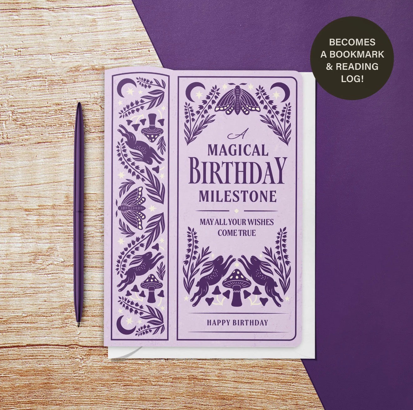Purple magical birthday milestone greeting card with illustrated moths, hares, mushrooms and a reusable bookmark and reading log.