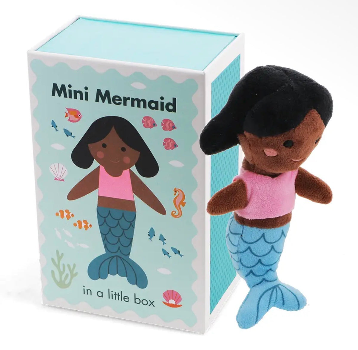 Mini mermaid soft toy with dark hair, pink top and blue tail displayed beside its illustrated gift box.