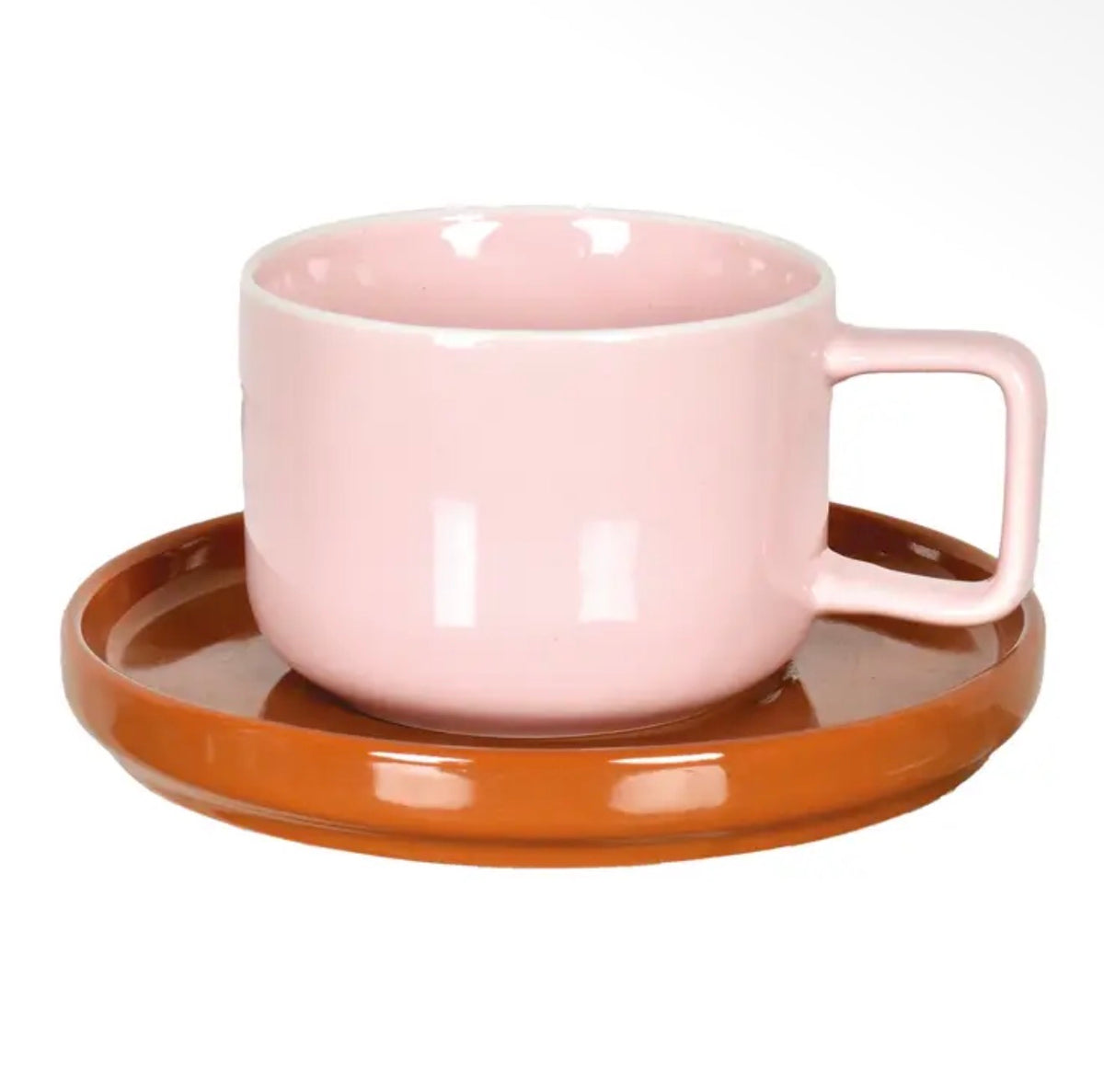 Glossy pale pink cup with a square handle paired with a contrasting warm brown saucer.