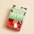 Ceramic red and white toadstool keepsake token presented in a colourful matchbox with the message “So Mushroom in My Heart for You”.