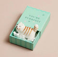 Ceramic striped cat keepsake token presented in a mint green matchbox with the message “You’re Purrfect”.